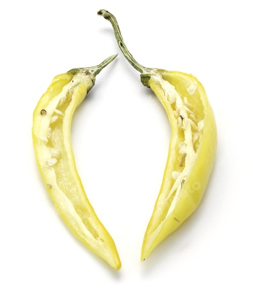 Preview: Sliced, Two Halves Of Yellow Chili Pepper Isolated On White Background