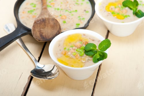 Preview: Hearty Middle Eastern Chickpea And Barley Soup With Mint Leaves On Top