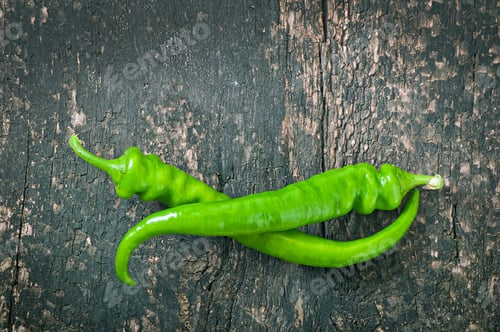 Preview: Green Chili Peppers On Old Wooden Background