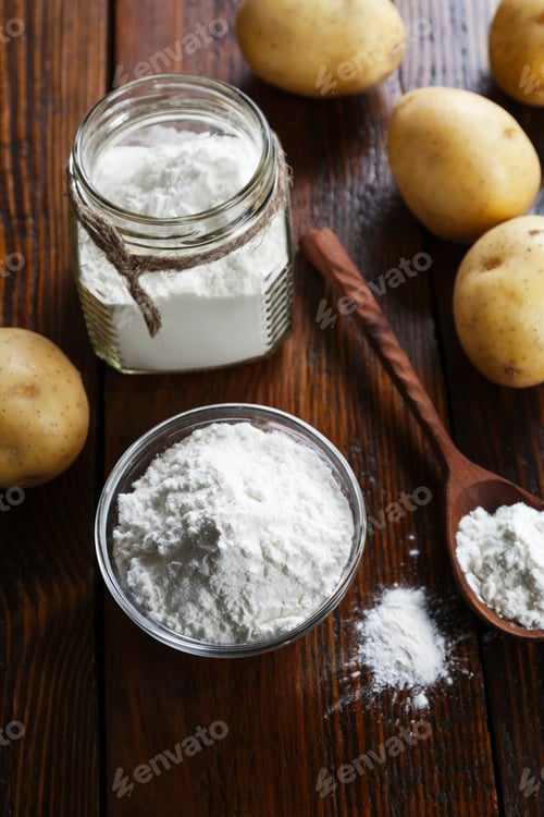 Preview: Potato Starch In A Glass Bowl On Wooden Table