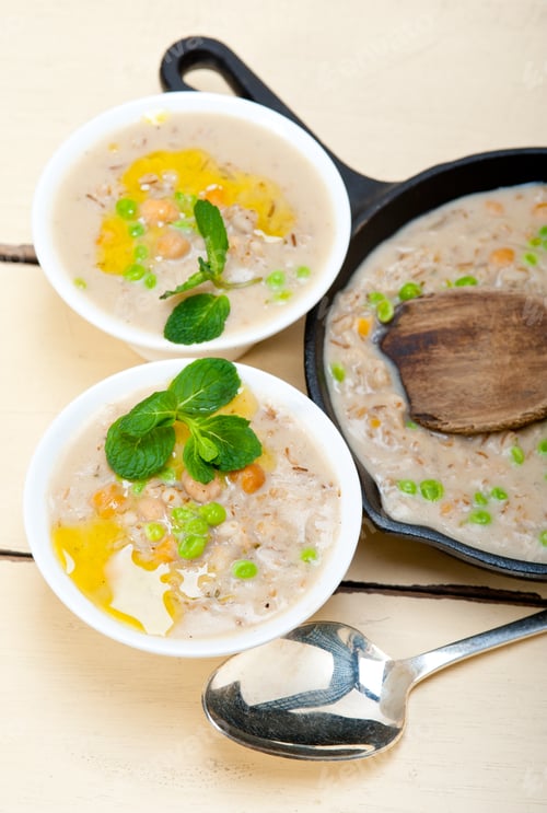 Preview: Hearty Middle Eastern Chickpea And Barley Soup With Mint Leaves On Top