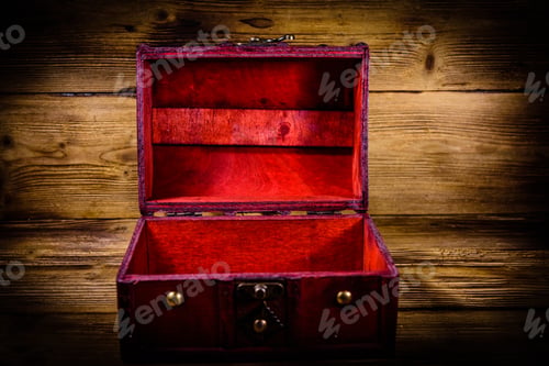 Preview: Opened Vintage Chest From Red Wood On Rustic Wooden Background