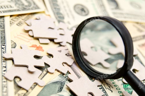 Preview: Puzzle And Magnifier On Money (Dollars).