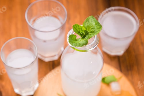 Preview: Fresh Soda Drink With Ice And Mint On Wooden Background