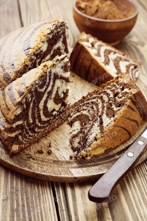 Preview: Cake With Cocoa Powder On The Wooden Table