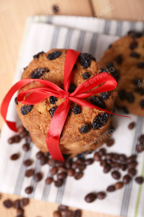 Preview: Few Cookie With A Red Ribbon On Fabric