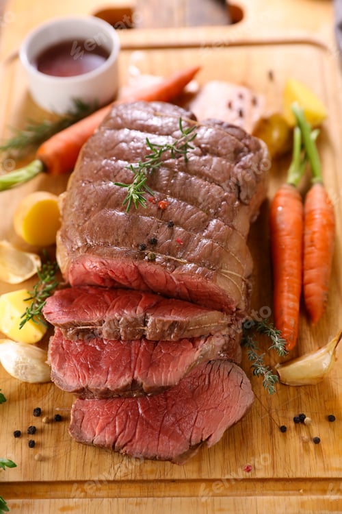 Preview: Roast Beef With Vegetable On Wooden Board