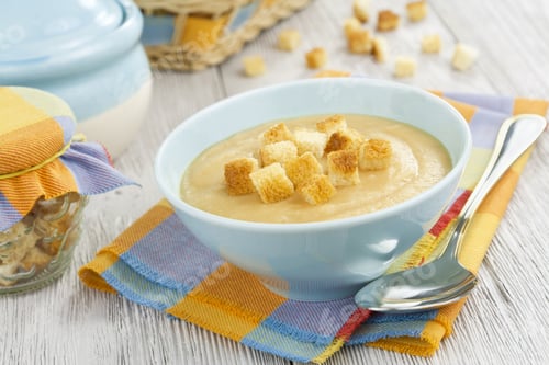 Preview: Pea Soup With Dried Crust In The Bowl On The Table