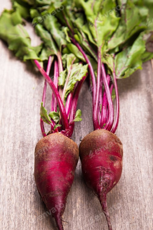 Preview: Two Fresh Ripe Beet On Wooden Background In Studio