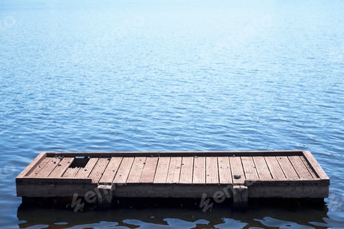 Preview: Raft Pier On Dreamy Lake Scene Under Bright Sunlight And Blue Reflection Of The Sky