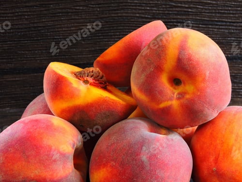 Preview: A Bunch Of Peaches On A Dark Background. Close Up.