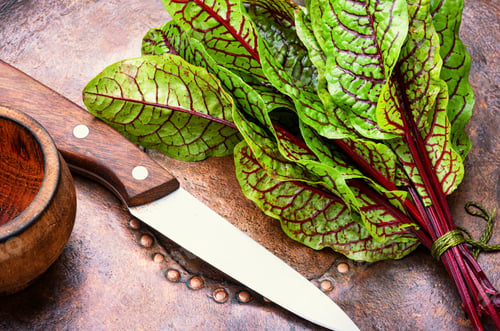 Preview: Bunch Of Raw Sorrel On Retro Background.Sorrel Bloody Mary