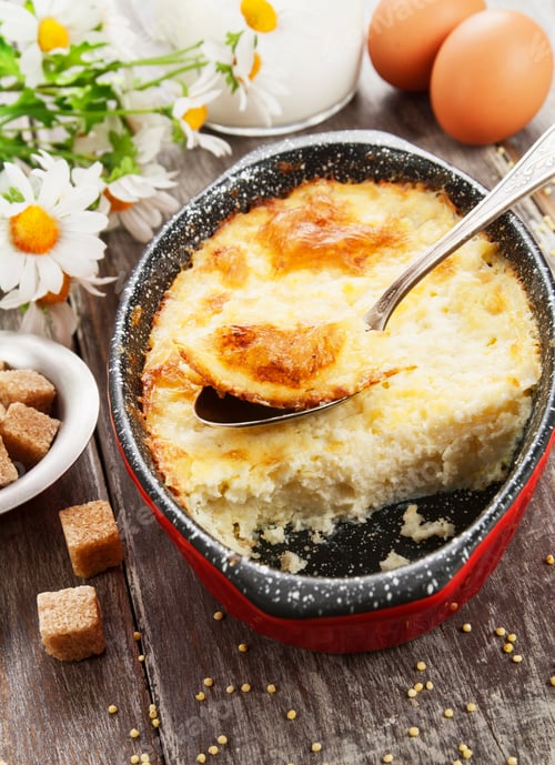 Preview: Homemade Millet Casserole On A Wooden Table