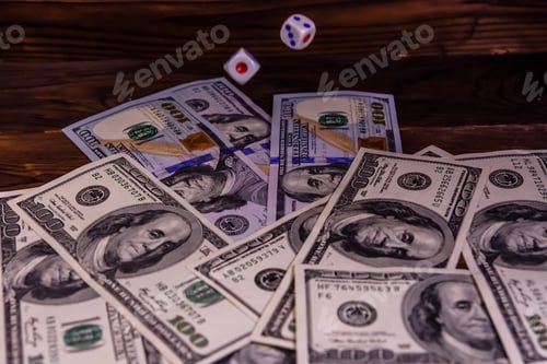 Preview: Dice In Flight Above The One Hundred Dollar Bills. Gamble Concept