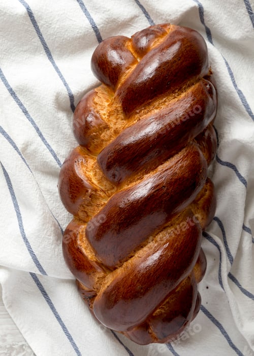 Preview: Homemade Challah Jewish Bread On Cloth, Top View. Flat Lay, Overhead, From Above. Close-Up.