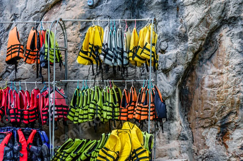 Preview: Many Life Vests On Hangers In Canyon