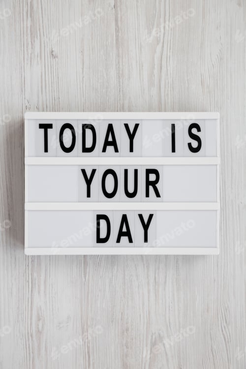 Preview: 'Today Is Your Day' On A Modern Board On A White Wooden Background, Top View. Flat Lay, Overhead