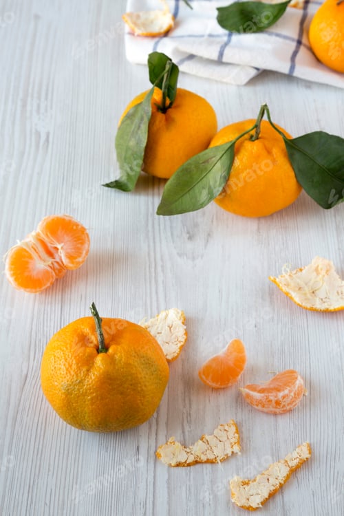 Preview: Fresh Ripe Tangerines On White Wooden Background, Side View.