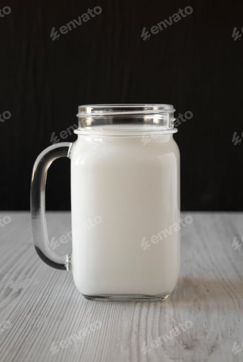 Preview: Coconut Milk In A Glass Jar Mug, Side View.