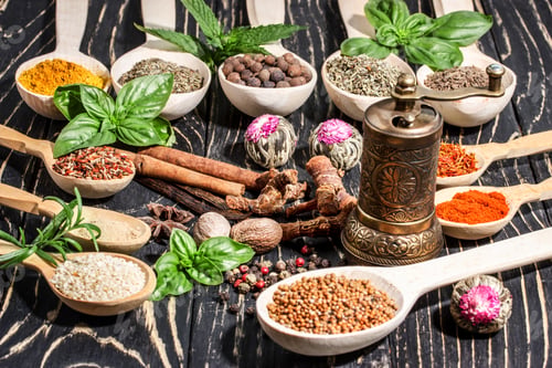Preview: Colorful Aromatic Spices And Herbs On An Old Oak Wooden Brown Backgrownd