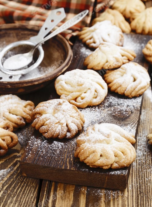 Preview: Homemade Cookies With Powdered Sugar On The Table