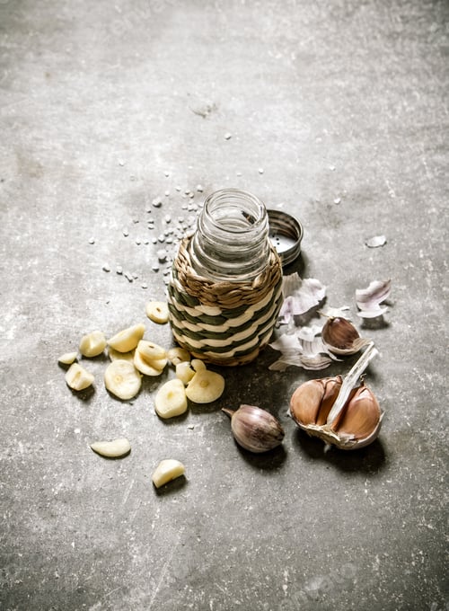 Preview: Spicy Background. Fragrant Garlic Salt. On A Stone Background.