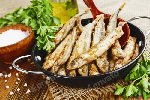 Preview: Fried Fish Capelin In A Pan On The Table