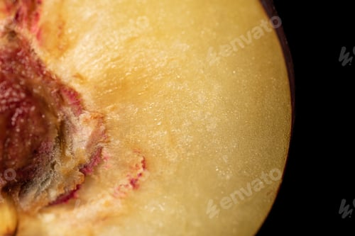 Preview: One Half Of Ripened Fresh Red Plum Isolated On Black Glass