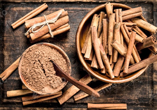 Preview: Ground Cinnamon In A Bowl. On Wooden Background.