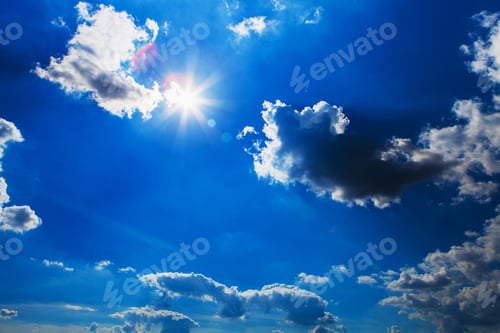 Preview: Blue Sky with White Clouds and Bright Sun