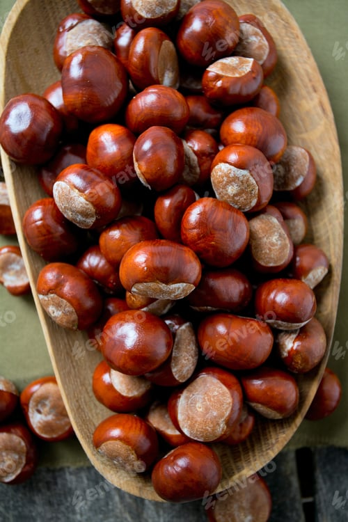 Preview: Chestnuts On Wooden Surface