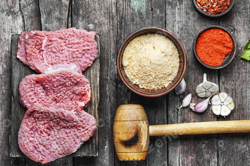 Preview: Raw Veal Chop Steak On Kitchen Board With Spices