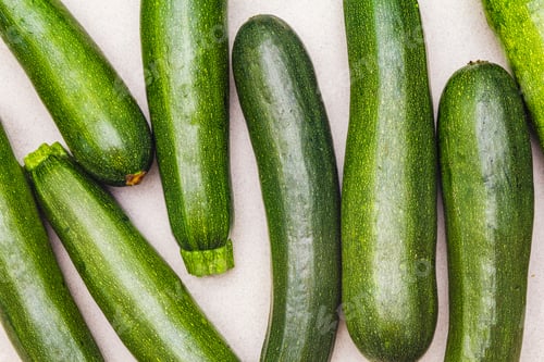 Preview: Bright Green Zucchini. Fresh Vegetables For Cooking. Harvest On Stone Background, Top View, Close