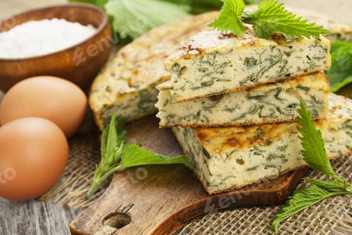 Preview: Pie With Nettle And Cheese On The Table