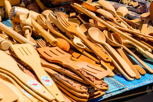 Preview: Different Wooden Utensil For Sale On Street Fair