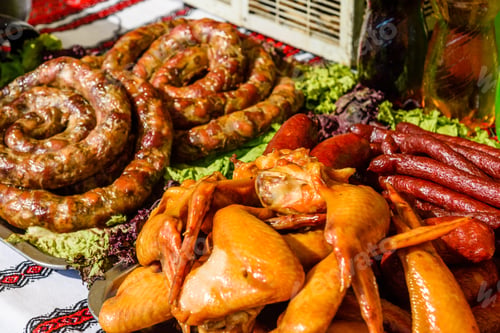 Preview: Homemade Sausage On A Green Lettuce Leaves