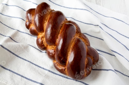 Preview: Homemade Challah Jewish Bread On Cloth, Close-Up. Jewish Pastries.