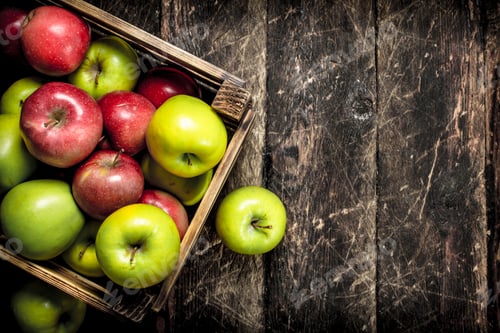 Preview: Box With Fresh Red And Green Apples. On A Wooden Background.