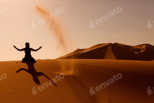 Preview: Sillhouette Of Woman Playing And Throwing With Sands In Desert Sahara, Creating Berber Sign From