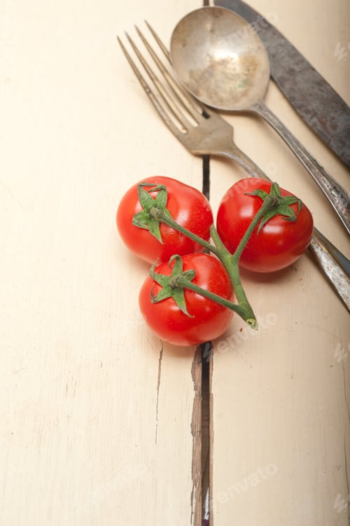 Preview: Ripe Cherry Tomatoes Cluster Over White Rustic Wood Table