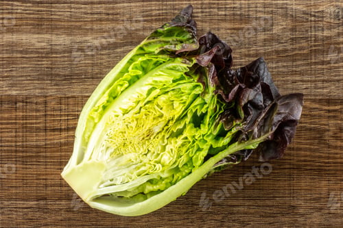 Preview: One Half Of Fresh Green Lettuce Red Little Gem Variety Flatlay On Brown Wood