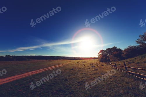 Preview: House In A Field In The Background Of Mountains