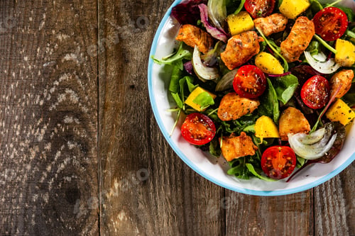 Preview: Salad With Chicken, Mango And Tomatoes On Wooden Table