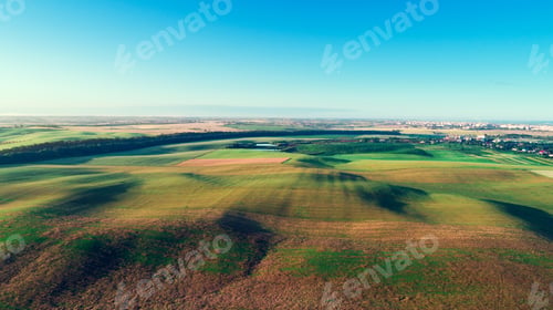 Preview: Drone With A Camera On A Green Field.
