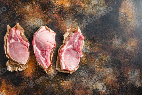 Preview: Organic Row Pork Pig Chop Entrecote. Fresh And Raw Meat. Organic Food. Top View In Craft Paper Over