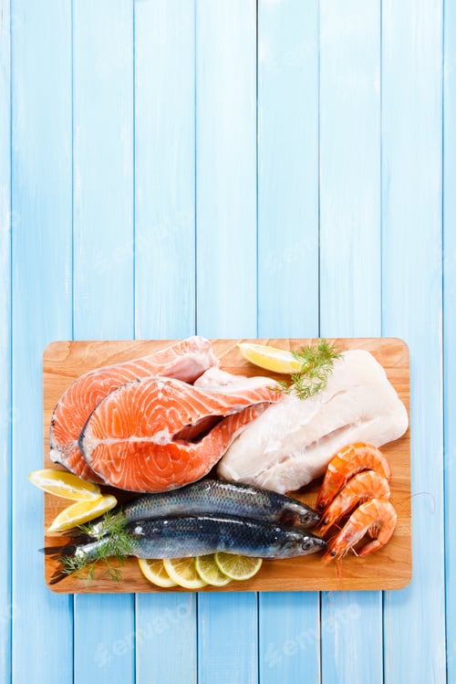 Preview: Raw Seafood On Cutting Board