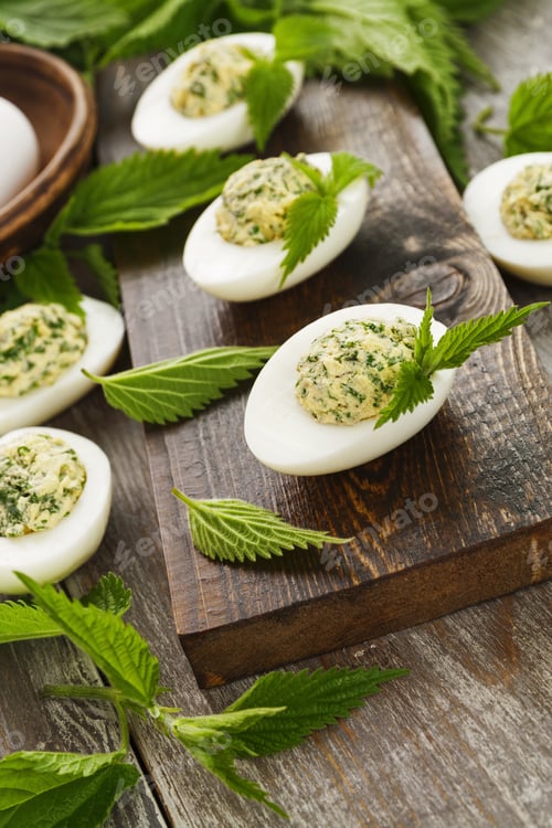 Preview: Boiled Eggs Stuffed With Nettles On The Table