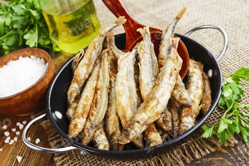 Preview: Fried Fish Capelin In A Pan On The Table