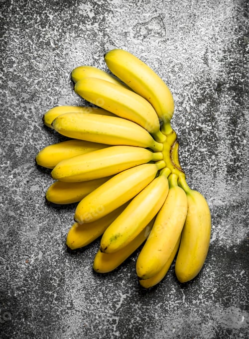 Preview: Fresh Ripe Bananas . On A Rustic Background.