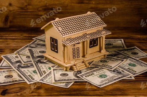 Preview: Plywood Model Of House And One Hundred Dollar Banknotes. Loan, Real Estate Concept
